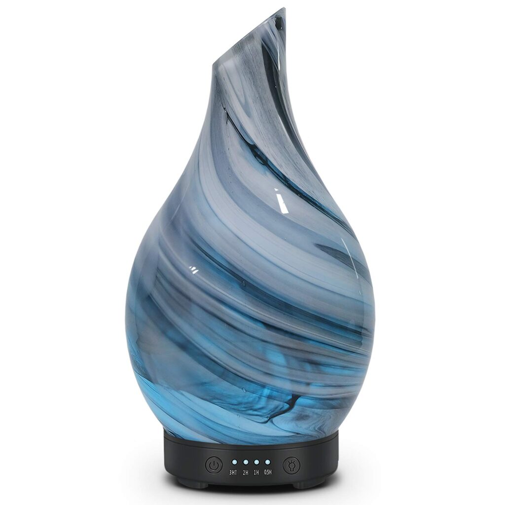 WP-167 150ml teardrop glass aroma diffuser in blue marble swirl on a black base