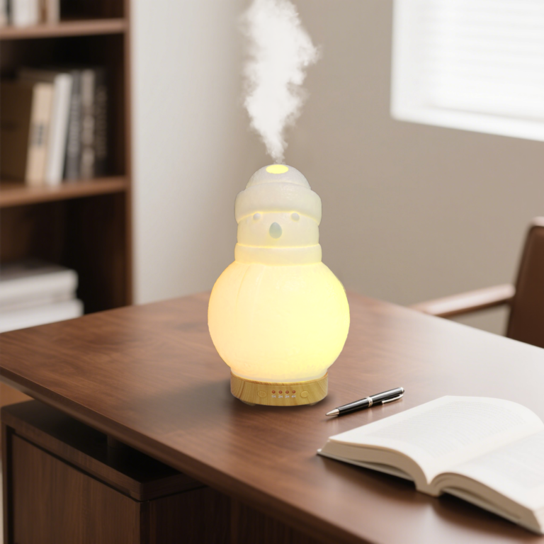 WP-176 snowman mini aroma diffuser with a warm amber glow on a wooden desk