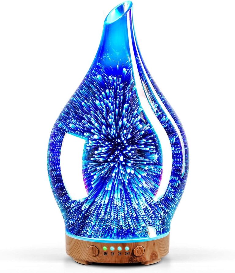 Handmade art glass aroma diffuser with an azure dandelion burst pattern on a wood grain base