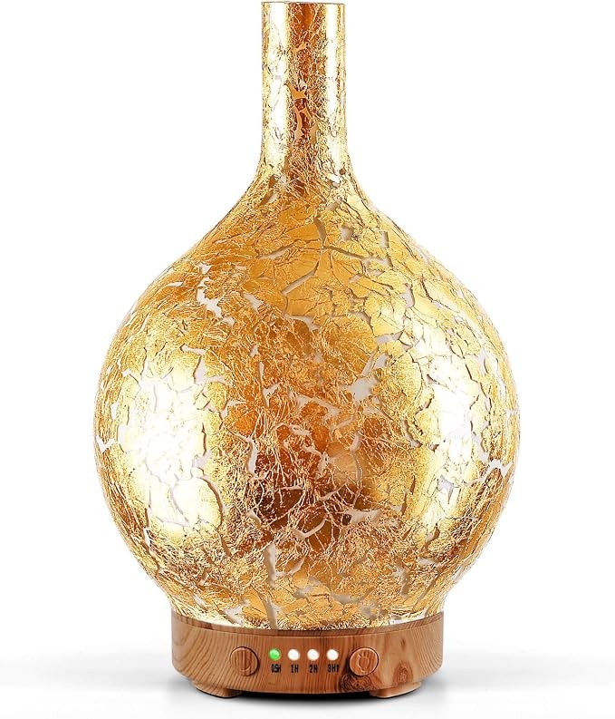 Handmade art glass aroma diffuser with a gold crackle foil pattern on a wood grain base