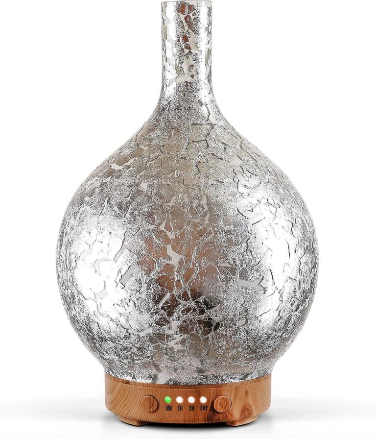 Handmade art glass aroma diffuser with a silver crackle foil pattern on a wood grain base