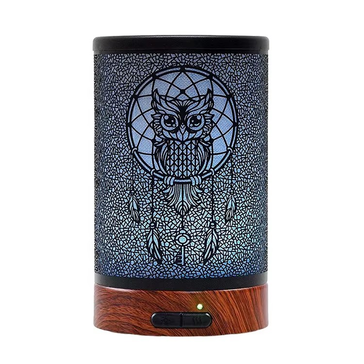 Iron aroma diffuser with an owl dreamcatcher pattern on a wood grain base