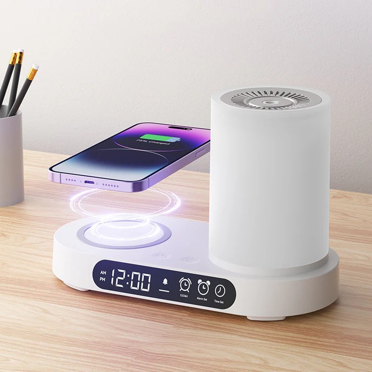 WP-032 aroma diffuser charging a smartphone wirelessly on its charging pad