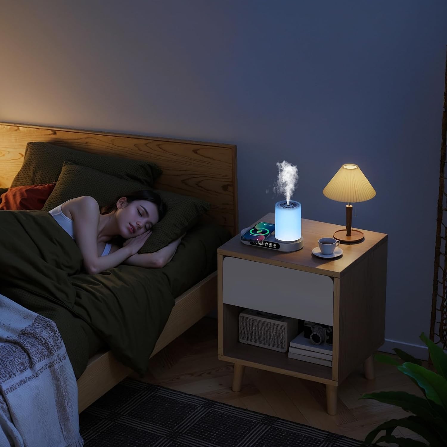 WP-032 wireless charger aroma diffuser beside a bed at night with the 7-colour light on