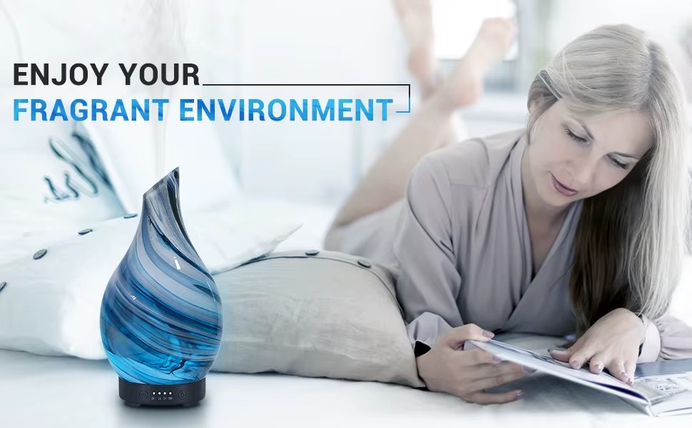 WP-167 teardrop glass aroma diffuser scenting a living space with a fine fragrant mist